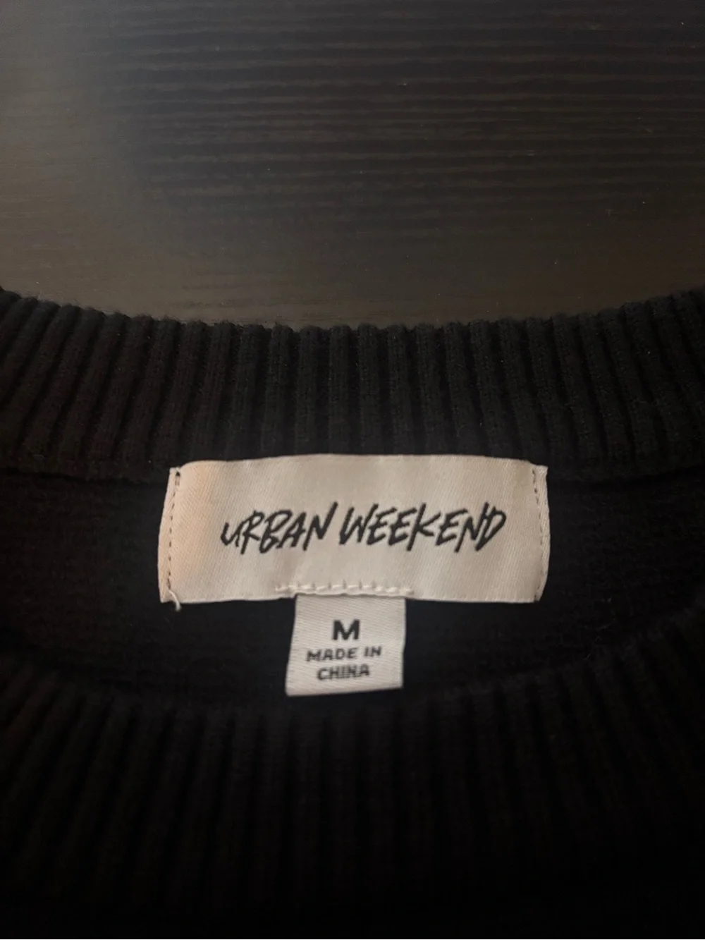 Urban Weekend Men black crewneck sweatshirt with white cursive text reading 'God